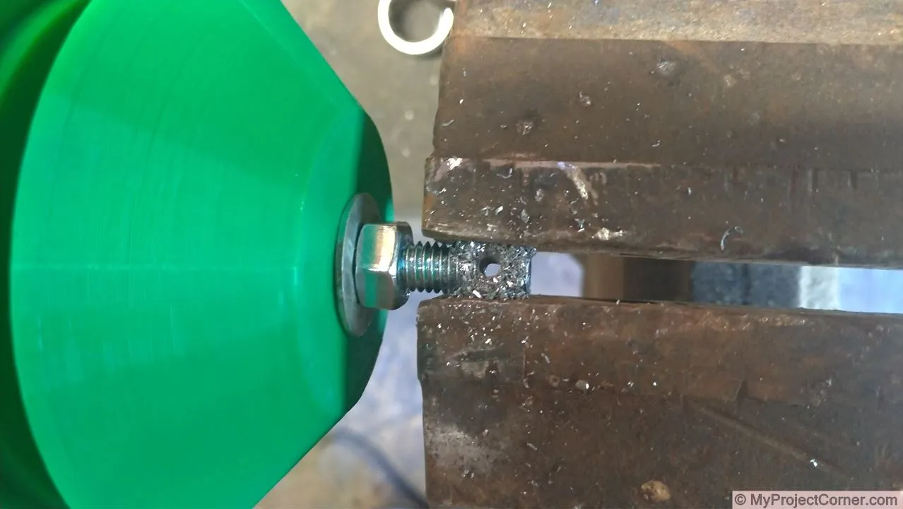 Drilling hole in storage jar fly trap