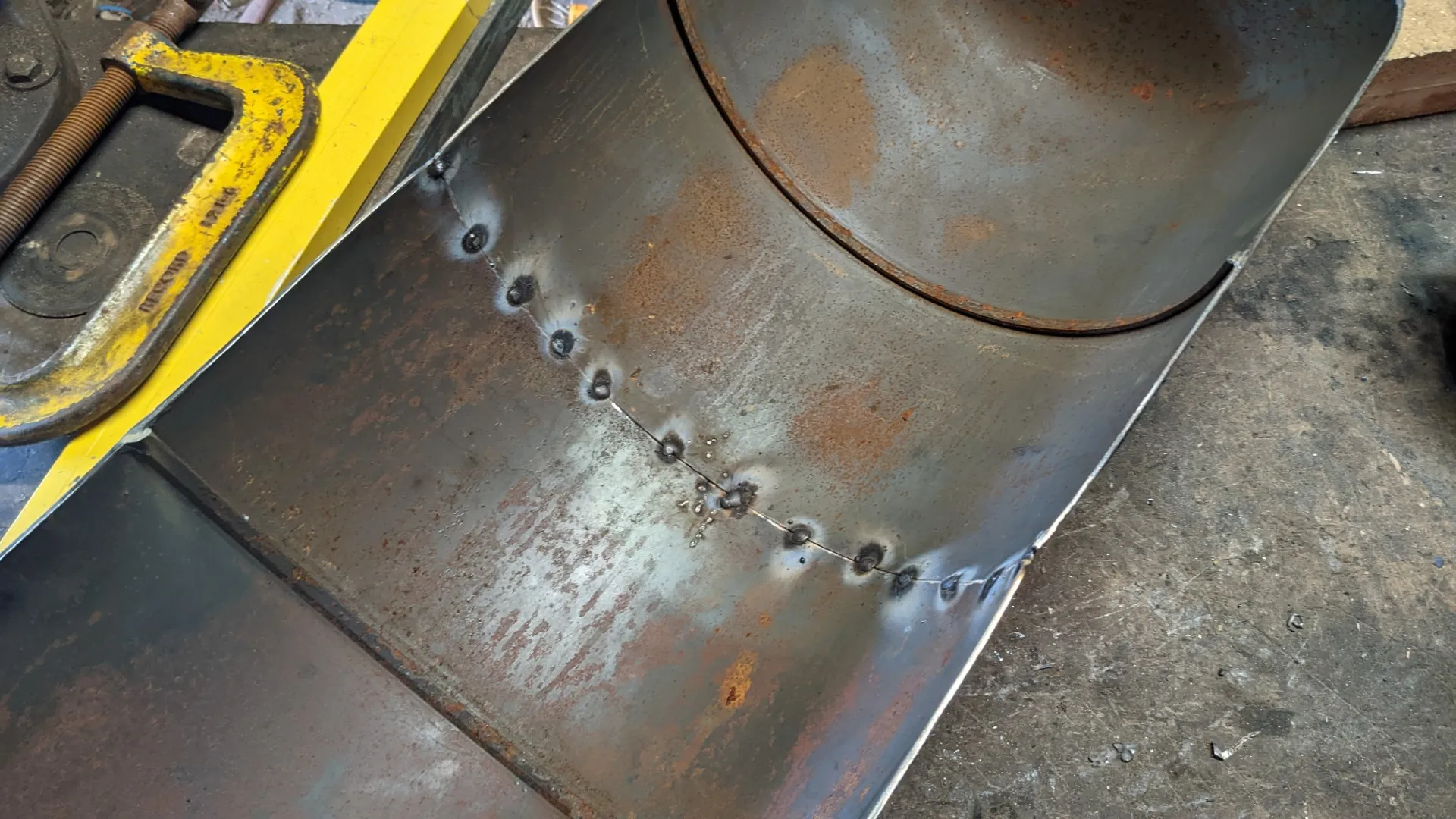 tack welding the gas bottle feeding trough