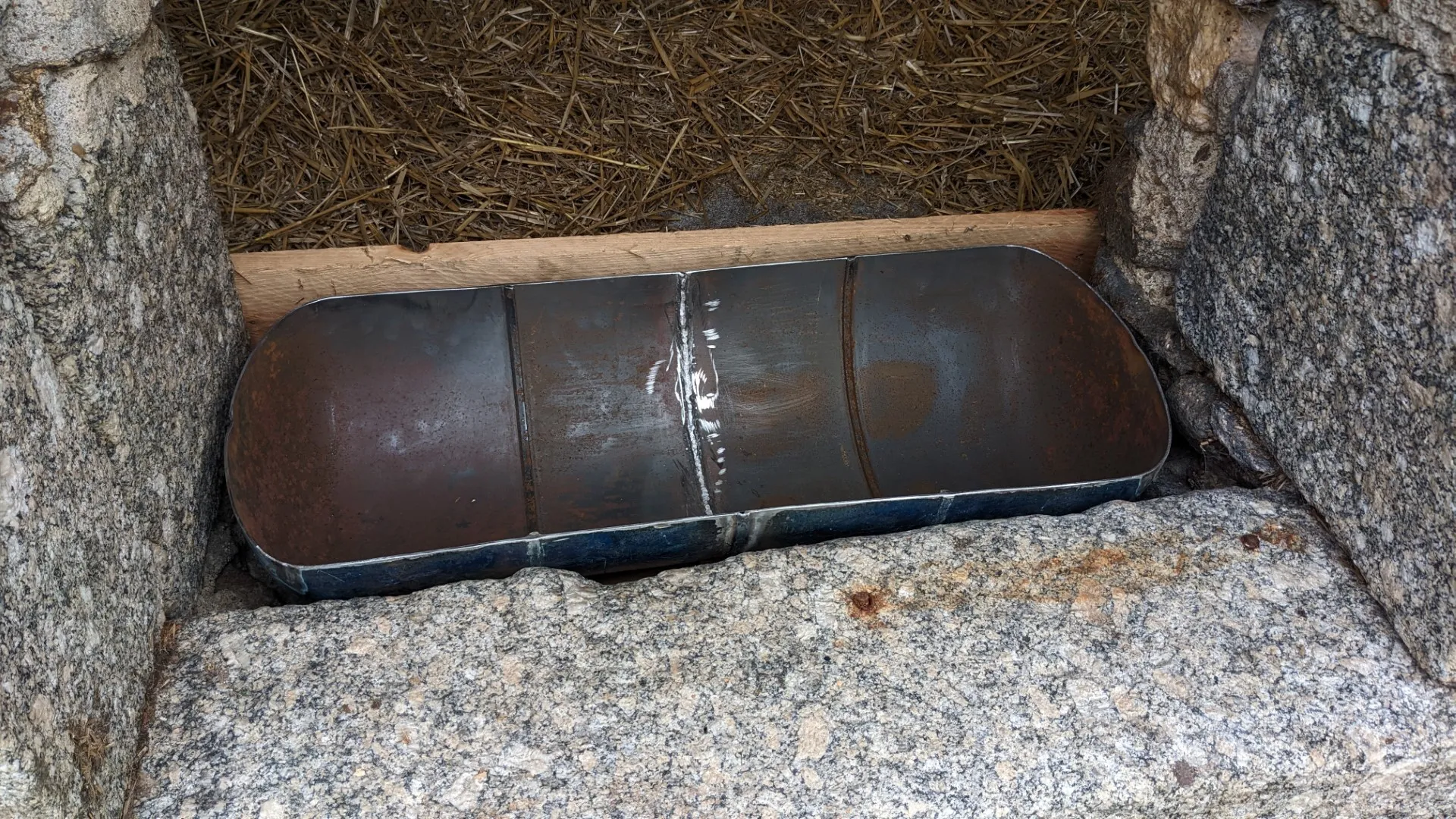 setting the gas bottle feeding trough in concrete