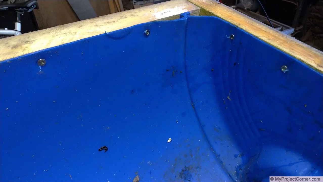 Half barrel screwed to frame - close up