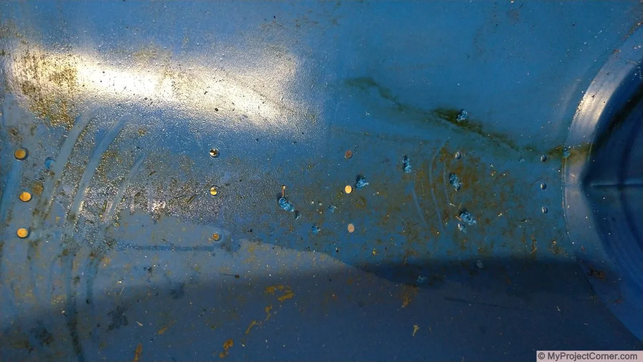 recycled barrel planter drainage holes