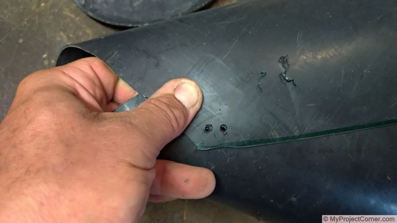 Rolling and drilling the chicken slaughter cone