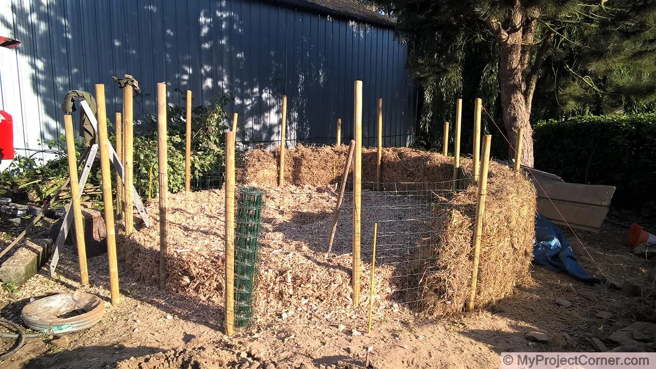 base layer of wood chips for compost pile complete