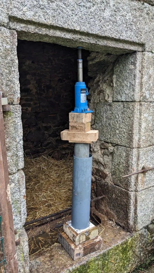 pressing a paper and sawdust log