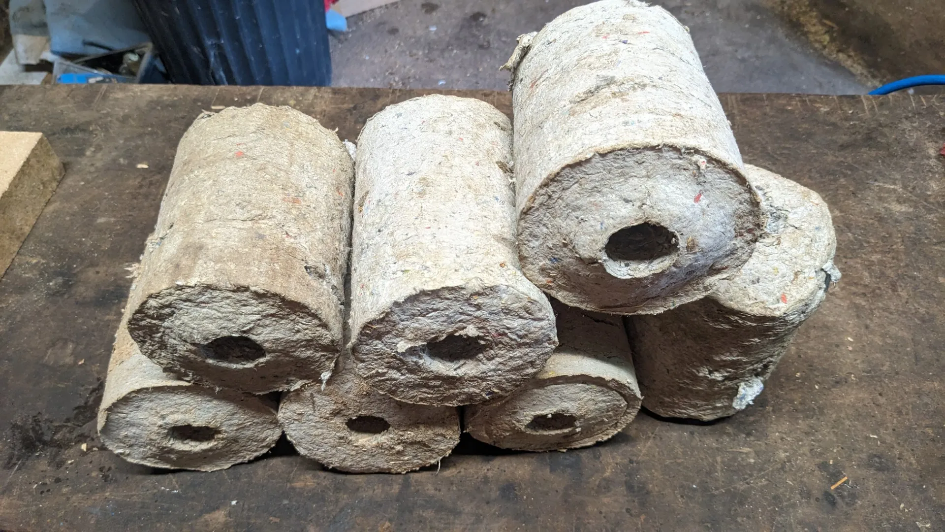 finished compressed paper and sawdust logs