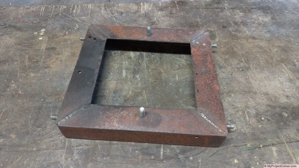 framework for wood pellet rocket stove