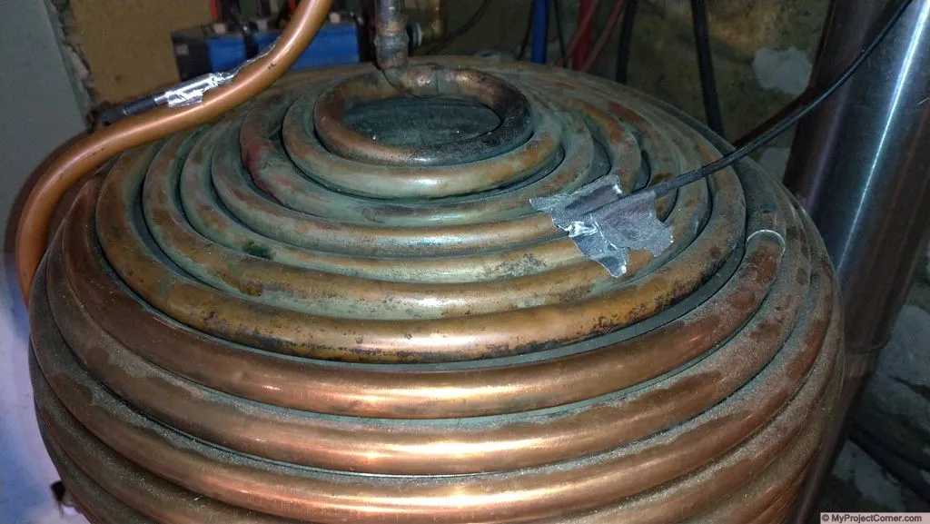 Tight copper coils for pellet stove heat recovery
