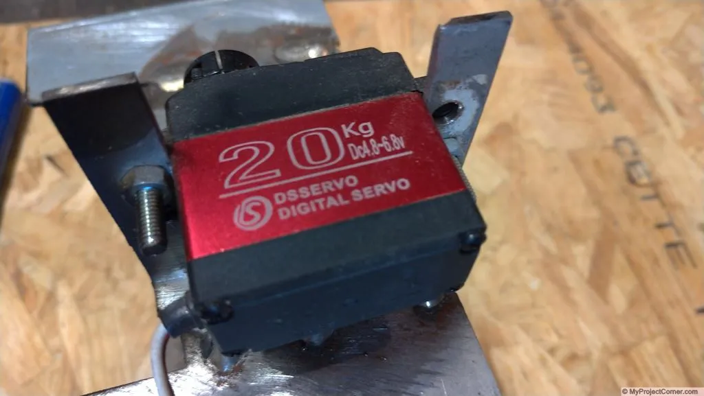 Servo for pellet rocket stove