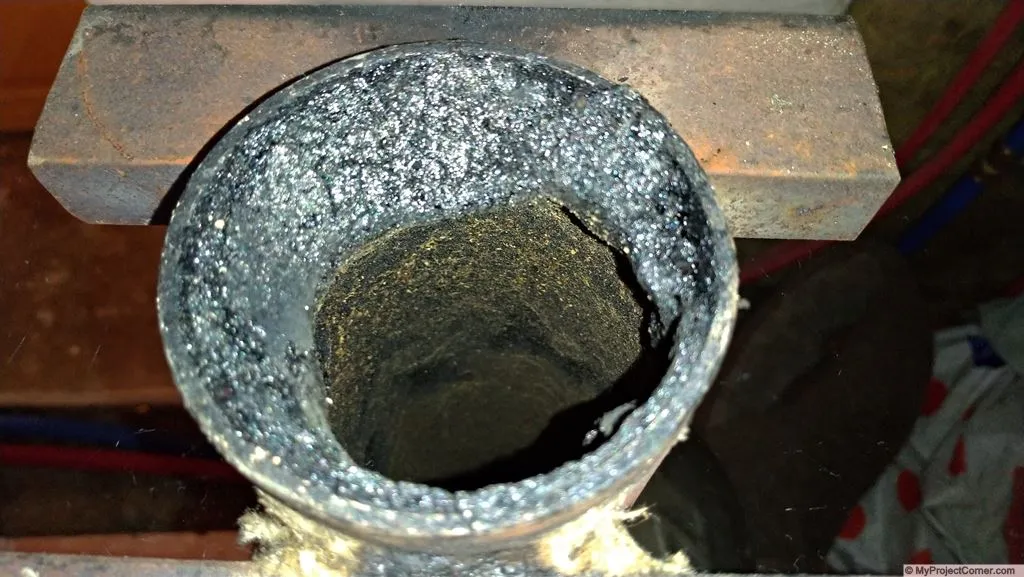 tar build up in pellet feed pipe