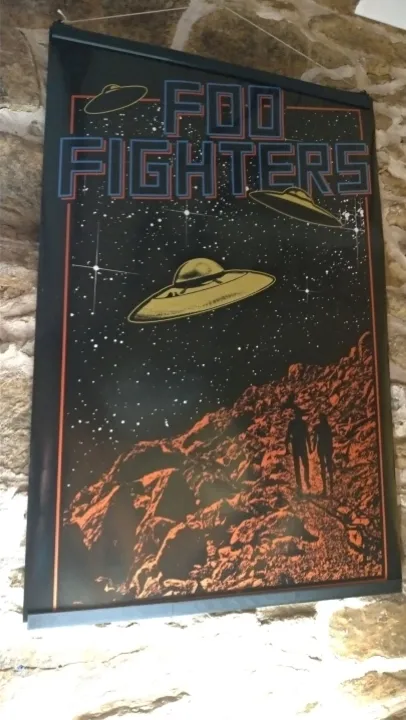 poster hung up with diy poster holder