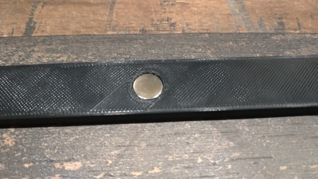 insert magnetics using spatula