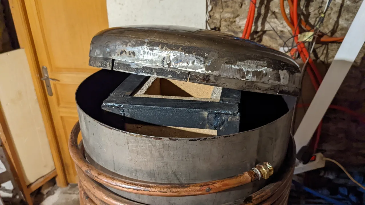 adding the top of the cylinder to the stove