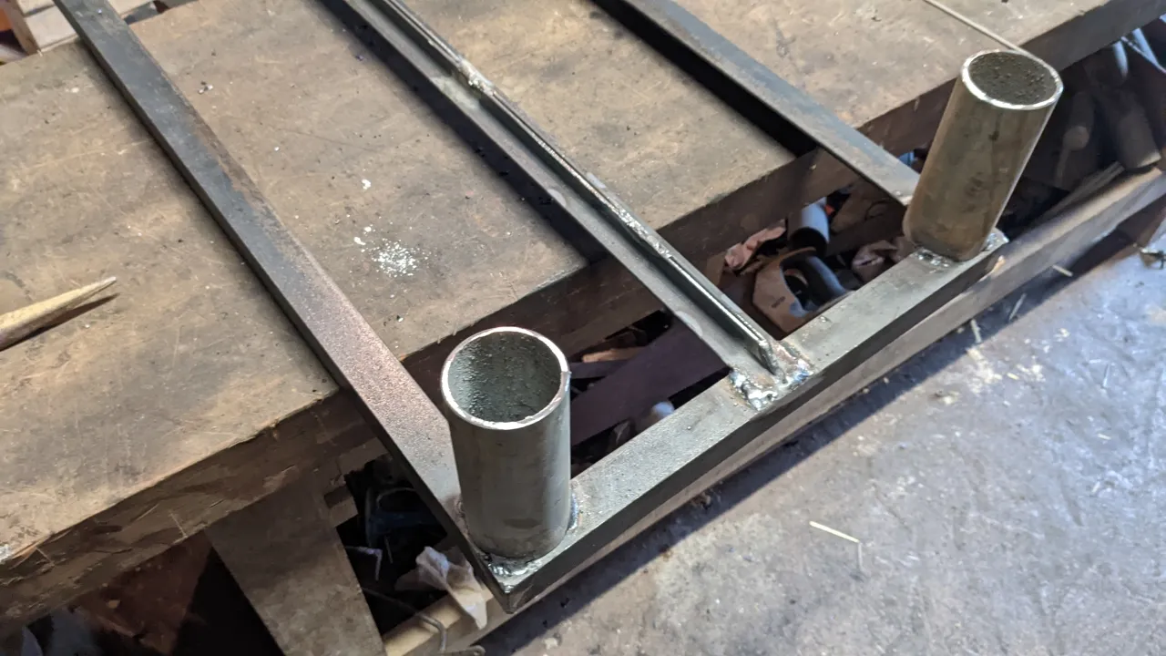 adding legs to rocket stove base frame