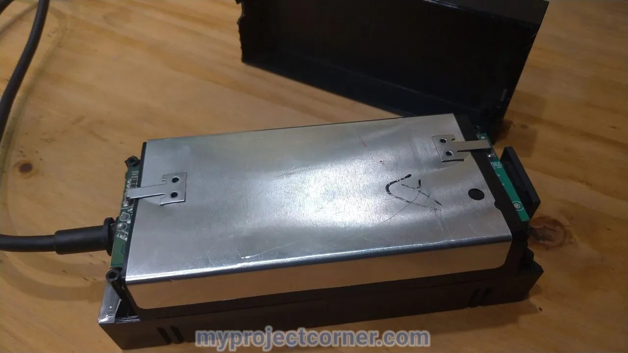 Removing bottom half of xbox psu case